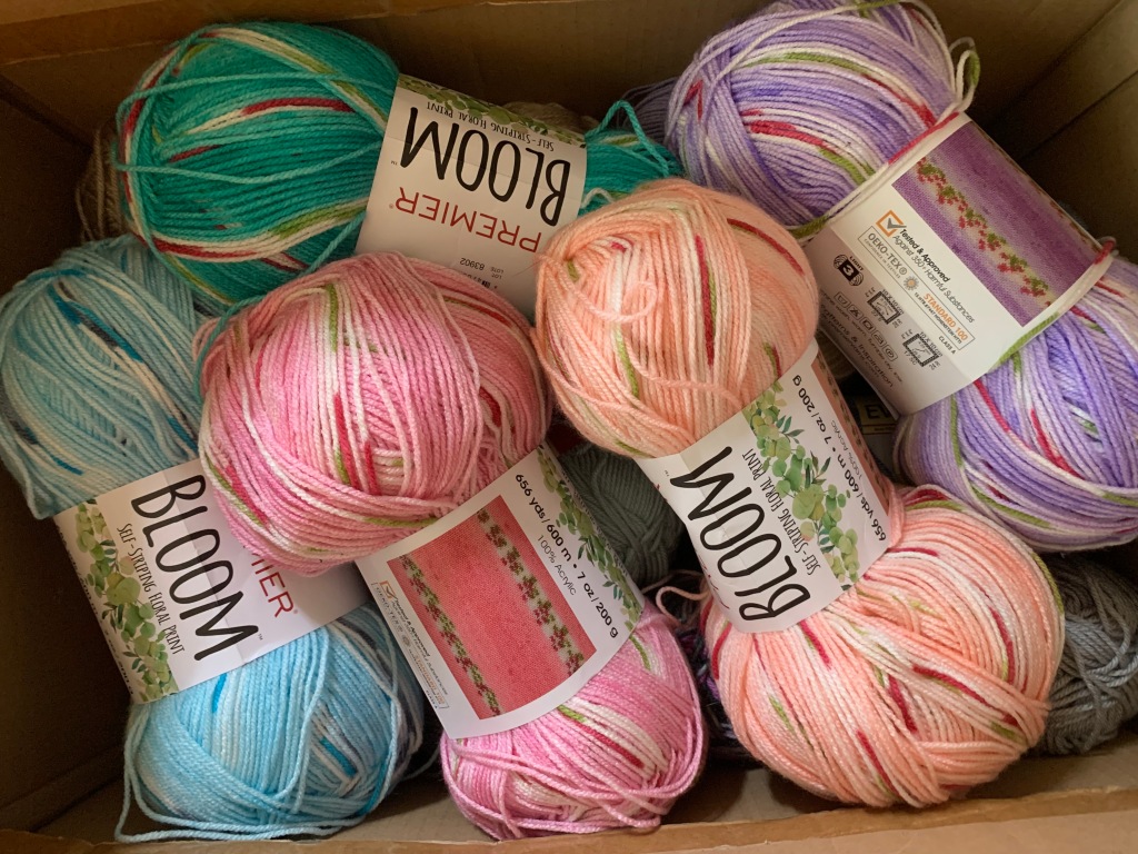 crochet, premier yarn, premier bloom yarn, flower yarn, self patterning yarn, knit, hook, moss stitch, crochet blanket, crochet flower
